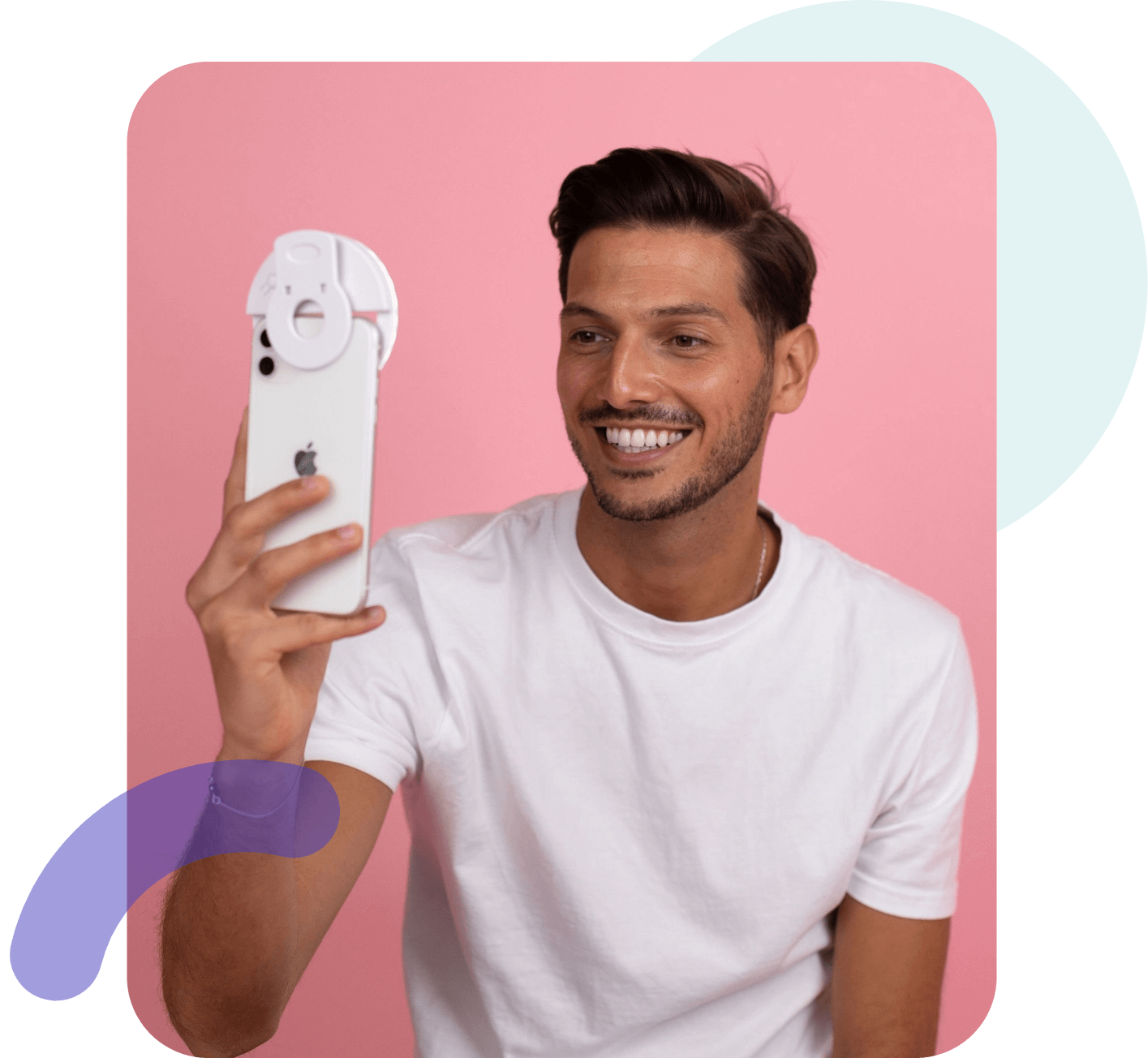 Young man taking a selfie for his free online consultation with Virtuoso aligners on his phone through the Instant Dentist app